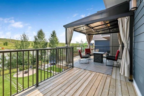100 Cranbrook Gardens West, Calgary, AB - Outdoor With Balcony With Deck Patio Veranda With Exterior