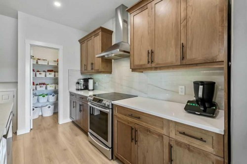 100 Cranbrook Gardens West, Calgary, AB - Indoor Photo Showing Kitchen