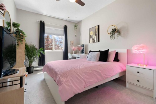 1301-7451 Springbank Boulevard Sw, Calgary, AB - Indoor Photo Showing Bedroom