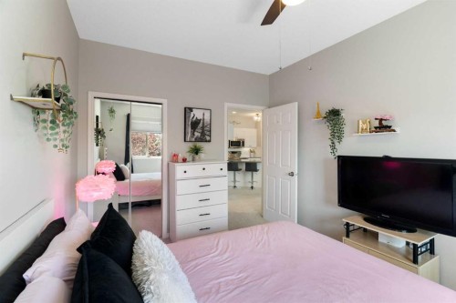 1301-7451 Springbank Boulevard Sw, Calgary, AB - Indoor Photo Showing Bedroom