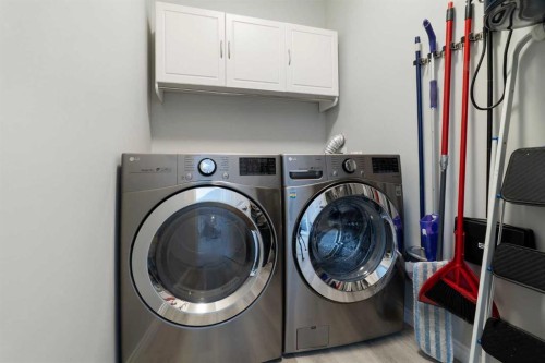 1301-7451 Springbank Boulevard Sw, Calgary, AB - Indoor Photo Showing Laundry Room