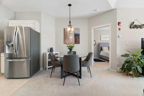 1301-7451 Springbank Boulevard Sw, Calgary, AB - Indoor Photo Showing Dining Room