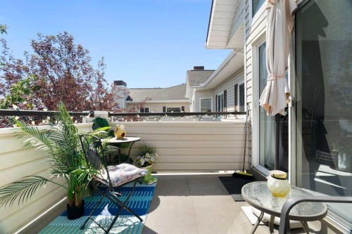 1301-7451 Springbank Boulevard Sw, Calgary, AB - Outdoor With Deck Patio Veranda With Exterior