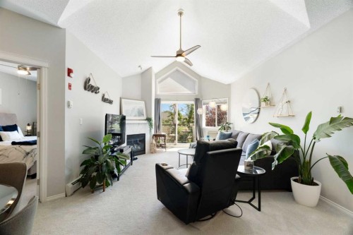 1301-7451 Springbank Boulevard Sw, Calgary, AB - Indoor With Fireplace