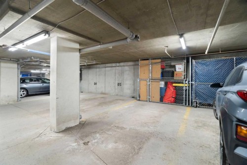 1301-7451 Springbank Boulevard Sw, Calgary, AB - Indoor Photo Showing Garage