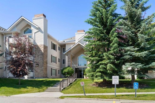 1301-7451 Springbank Boulevard Sw, Calgary, AB - Outdoor With Facade