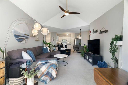 1301-7451 Springbank Boulevard Sw, Calgary, AB - Indoor Photo Showing Living Room