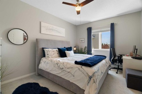 1301-7451 Springbank Boulevard Sw, Calgary, AB - Indoor Photo Showing Bedroom