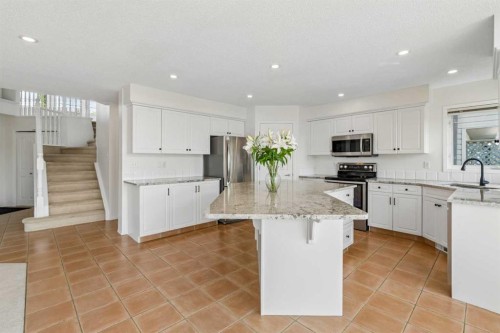 74 Spring View Sw, Calgary, AB - Indoor Photo Showing Kitchen With Stainless Steel Kitchen With Upgraded Kitchen
