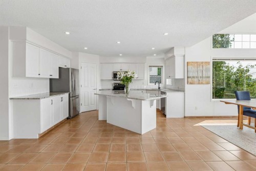 74 Spring View Sw, Calgary, AB - Indoor Photo Showing Kitchen With Stainless Steel Kitchen With Upgraded Kitchen