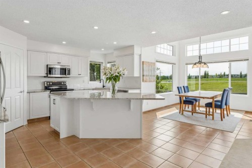 74 Spring View Sw, Calgary, AB - Indoor Photo Showing Kitchen With Upgraded Kitchen
