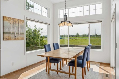 74 Spring View Sw, Calgary, AB - Indoor Photo Showing Dining Room