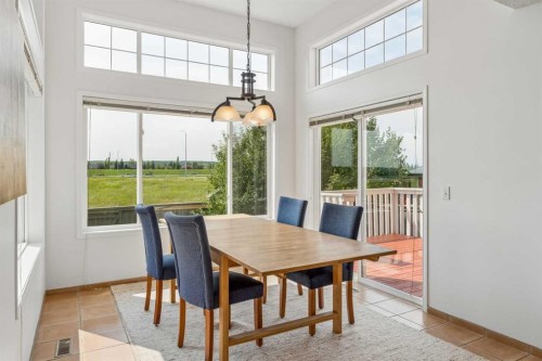 74 Spring View Sw, Calgary, AB - Indoor Photo Showing Dining Room