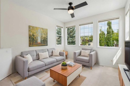 74 Spring View Sw, Calgary, AB - Indoor Photo Showing Living Room