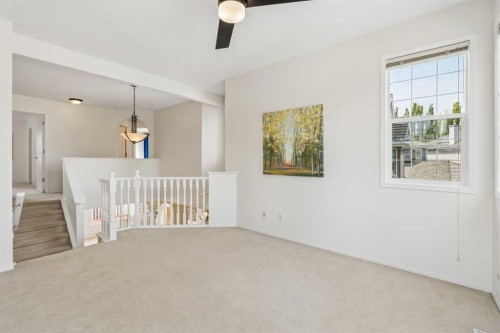 74 Spring View Sw, Calgary, AB - Indoor Photo Showing Other Room