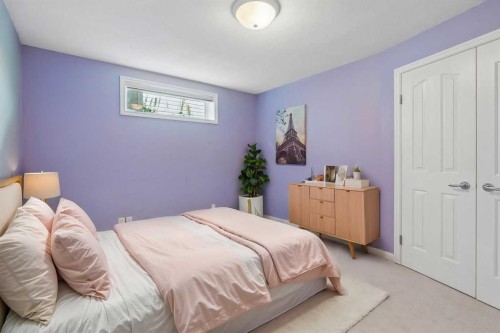 74 Spring View Sw, Calgary, AB - Indoor Photo Showing Bedroom
