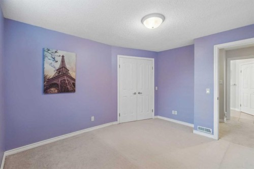 74 Spring View Sw, Calgary, AB - Indoor Photo Showing Other Room