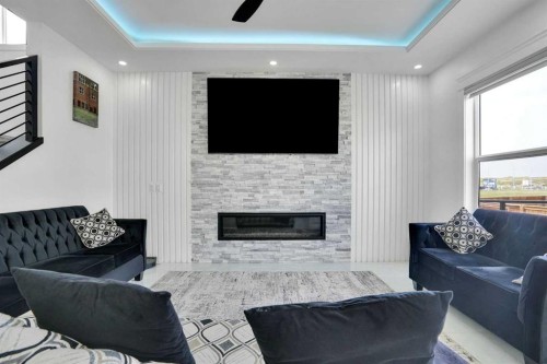 4508 87 Avenue Ne, Calgary, AB - Indoor Photo Showing Living Room With Fireplace
