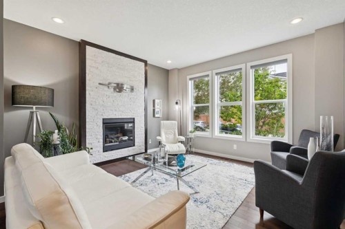 246 Mahogany Heights Se, Calgary, AB - Indoor Photo Showing Living Room With Fireplace