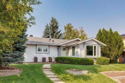 92 Woodford Drive SW Calgary, AB T2W 4C3