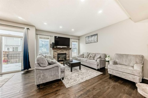 60 Evansborough Road Nw, Calgary, AB - Indoor Photo Showing Living Room With Fireplace