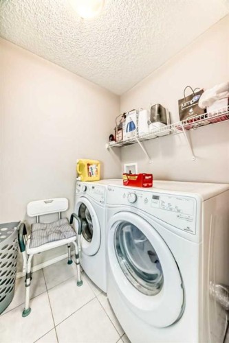 60 Evansborough Road Nw, Calgary, AB - Indoor Photo Showing Laundry Room