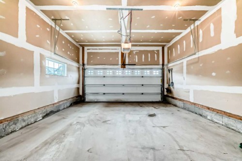 60 Evansborough Road Nw, Calgary, AB - Indoor Photo Showing Garage