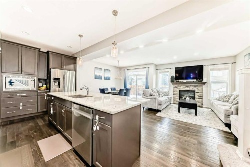 60 Evansborough Road Nw, Calgary, AB - Indoor Photo Showing Kitchen With Fireplace With Stainless Steel Kitchen With Upgraded Kitchen
