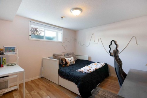 7 Emberside Hollow, Cochrane, AB - Indoor Photo Showing Bedroom