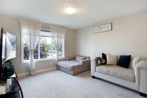 7 Emberside Hollow, Cochrane, AB - Indoor Photo Showing Living Room