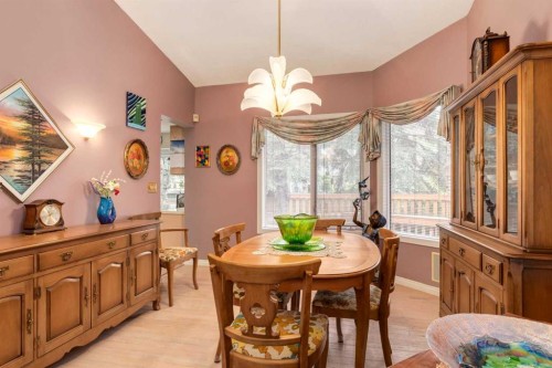 660 Coach Grove Road Sw, Calgary, AB - Indoor Photo Showing Dining Room