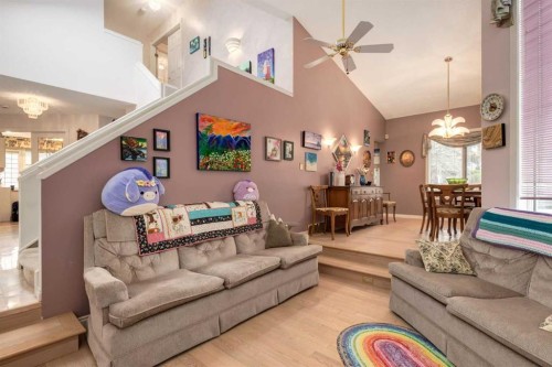 660 Coach Grove Road Sw, Calgary, AB - Indoor Photo Showing Living Room