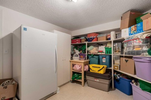660 Coach Grove Road Sw, Calgary, AB - Indoor Photo Showing Other Room