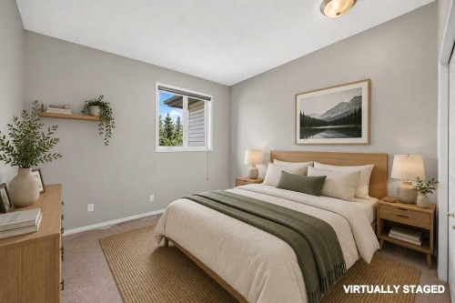 129 Carey, Canmore, AB - Indoor Photo Showing Bedroom
