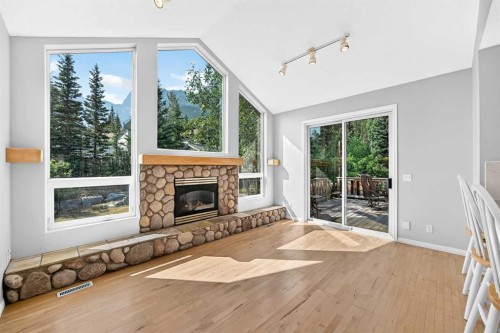 129 Carey, Canmore, AB - Indoor Photo Showing Other Room With Fireplace