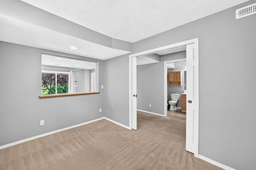 94 Panamount Rise Nw, Calgary, AB - Indoor Photo Showing Other Room