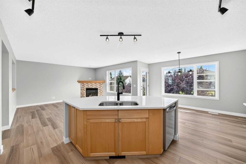 94 Panamount Rise Nw, Calgary, AB - Indoor Photo Showing Kitchen With Double Sink