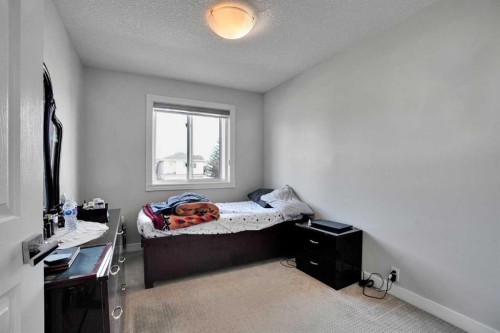 7276 California Boulevard Ne, Calgary, AB - Indoor Photo Showing Bedroom