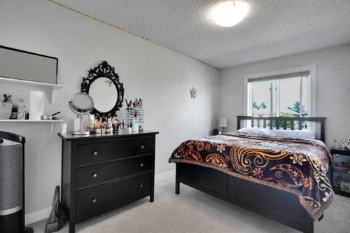 7276 California Boulevard Ne, Calgary, AB - Indoor Photo Showing Bedroom