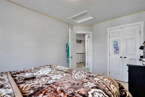 7276 California Boulevard Ne, Calgary, AB - Indoor Photo Showing Bedroom