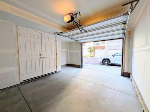 152-380 Seton Villas Se, Calgary, AB - Indoor Photo Showing Garage