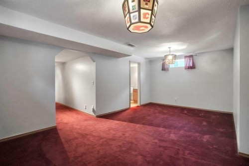 158 Saratoga Close Ne, Calgary, AB - Indoor Photo Showing Other Room
