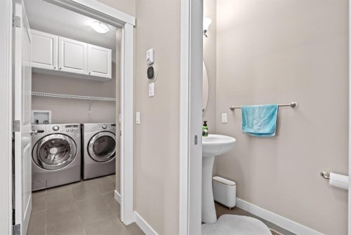 234 Covebrook Court Ne, Calgary, AB - Indoor Photo Showing Laundry Room
