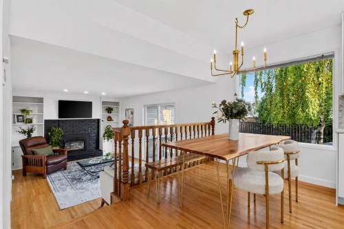 10719 Mapleglen Crescent Se, Calgary, AB - Indoor Photo Showing Other Room With Fireplace
