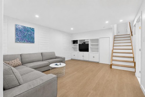 10719 Mapleglen Crescent Se, Calgary, AB - Indoor Photo Showing Living Room