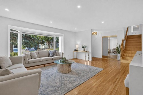 10719 Mapleglen Crescent Se, Calgary, AB - Indoor Photo Showing Living Room