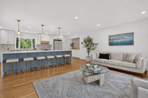 10719 Mapleglen Crescent Se, Calgary, AB - Indoor Photo Showing Living Room