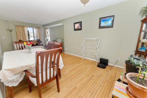 63 Hawkmount Green Nw, Calgary, AB - Indoor Photo Showing Dining Room