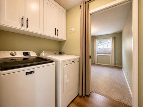 2-717 Centre Street, Vulcan, AB - Indoor Photo Showing Laundry Room