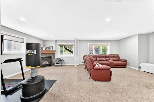23 Everoak Bay Sw, Calgary, AB - Indoor With Fireplace